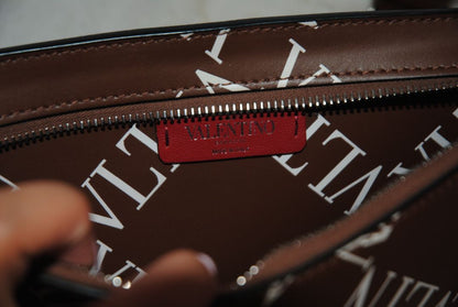 brown and white Valentino Logo leather crossbody bag