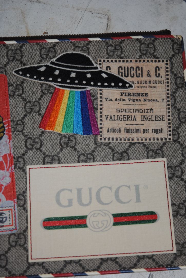 monogram Gucci supreme zip pouch wristlet