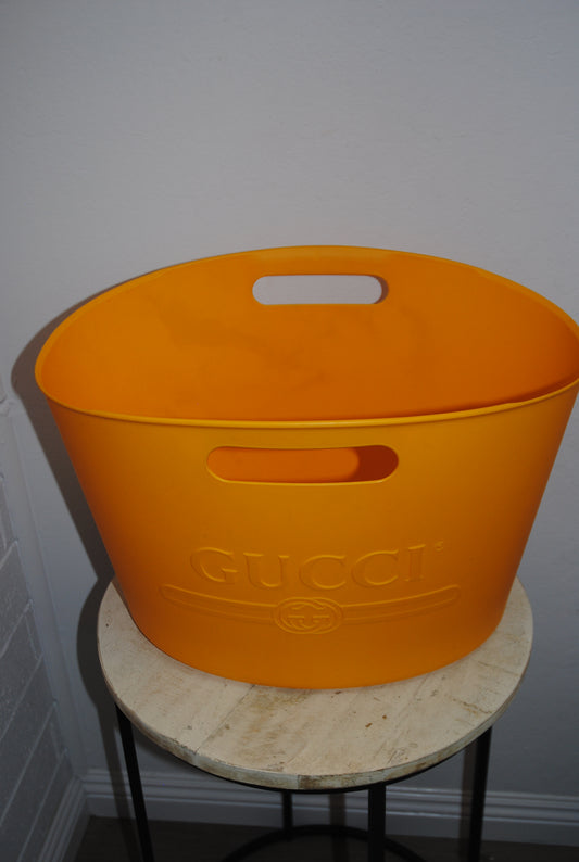 yellow Gucci storage bin