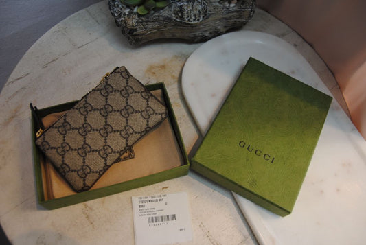 ivory canvas Gucci zip wallet