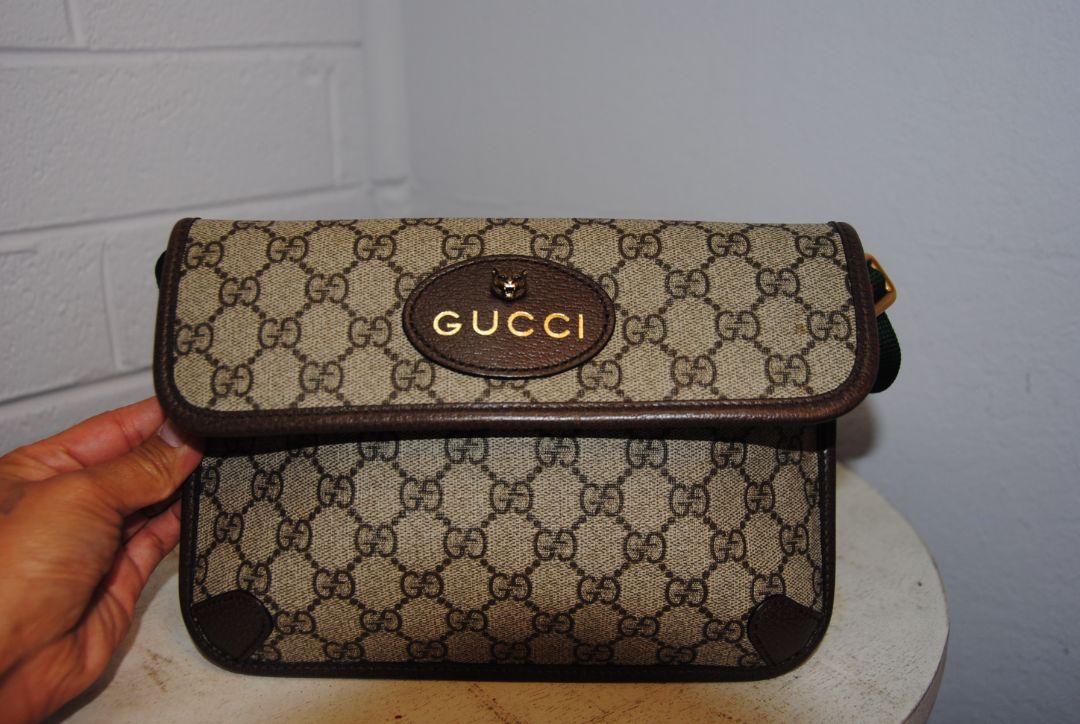 Neo Vintage Supreme Feline Head belt bag GUCCI
