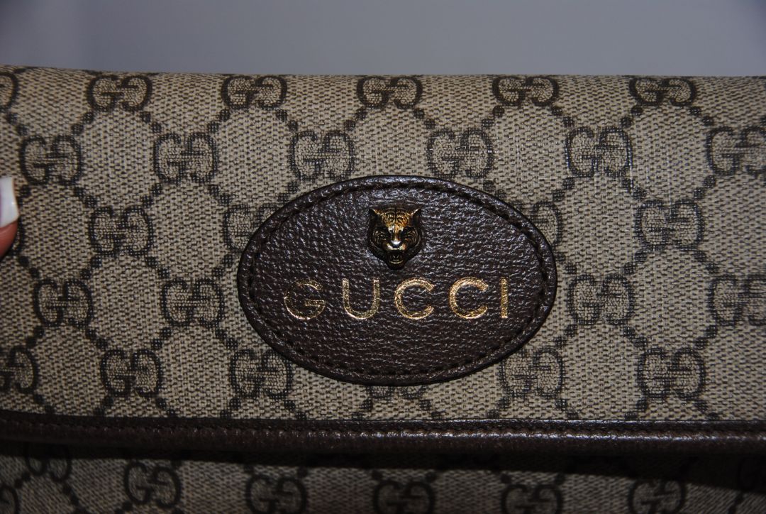 Neo Vintage Supreme Feline Head belt bag GUCCI