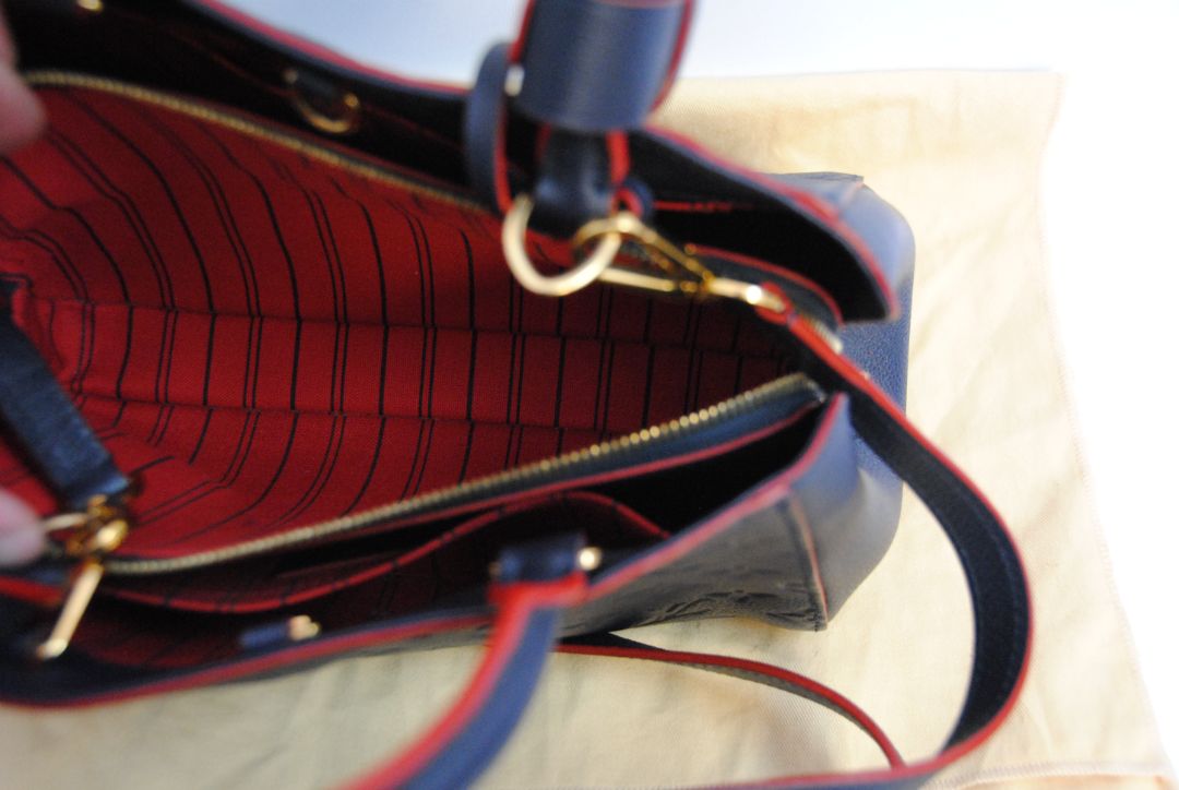 Louis Vuitton empriente top handle with strap