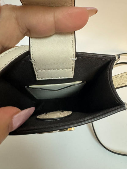 Fendi Fendigraphy Cellphone Pouch in signature FF monogram, featuring a sleek design with a detachable strap, gold-tone hardware, and a compact, functional interior to hold your phone and essentials.