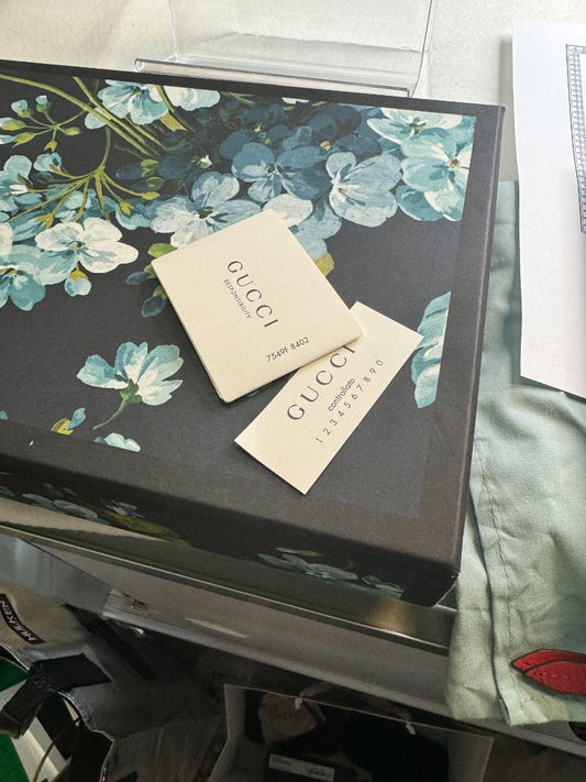 Gucci GG Supreme Monogram Blooms zip pouch in blue with floral print and logo canvas