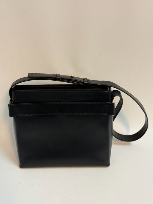 navy blue Ferragamo shoulder bag, Dimensions (Approximate): Height: 9” (22.9 cm) Width: 11.5” (29.2 cm) Depth: 4” (10.2 cm) Strap Drop: Adjustable from 10” to 13” (25.4 to 33 cm)