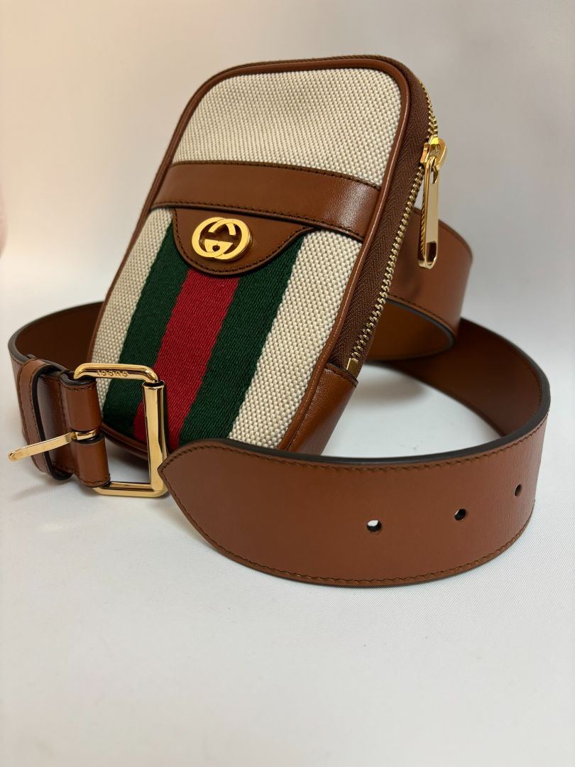 tan and white Gucci belt bag, 4x 6.5 x 1