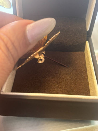 gold tone Jared brooch, Dimensions (Estimated from visual cues) • Diameter: ~2 inches (5.08 cm) • Height: ~1 inch (2.54 cm) • Weight: Unknown, but likely lightweight due to filigree structure