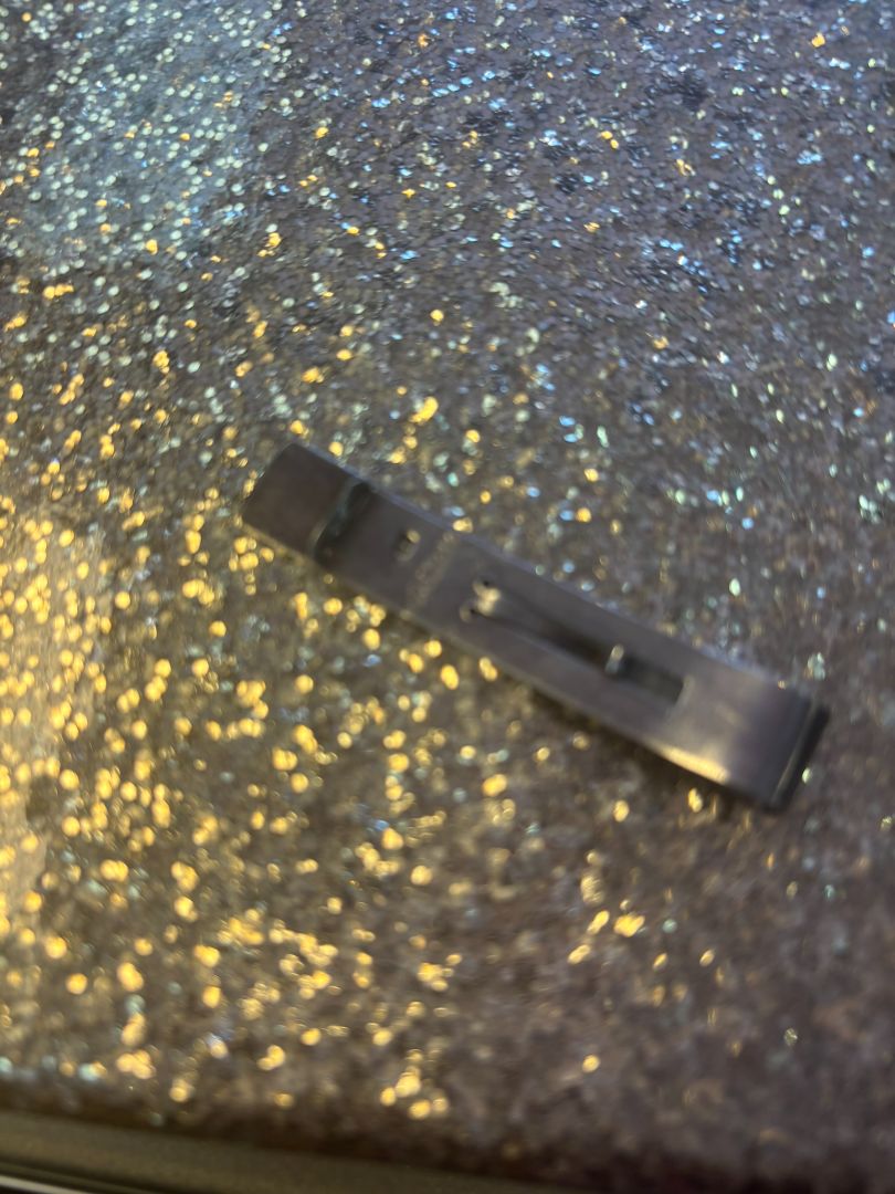 sterling silver NA tie bar, Dimensions (approx.): Length: 2.5 inches (6.35 cm) Width: 0.4 inches (1 cm) Clip style: Folded spring tension