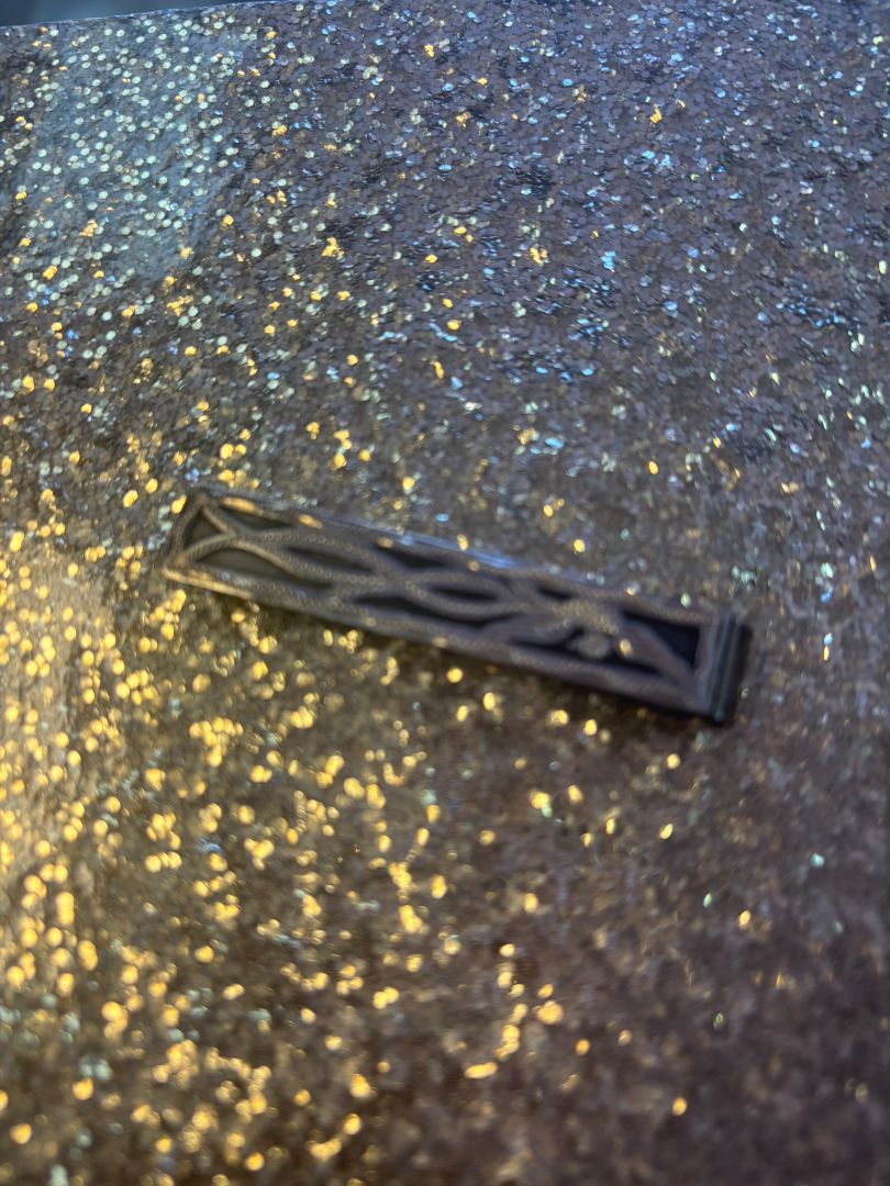 sterling silver NA tie bar, Dimensions (approx.): Length: 2.5 inches (6.35 cm) Width: 0.4 inches (1 cm) Clip style: Folded spring tension