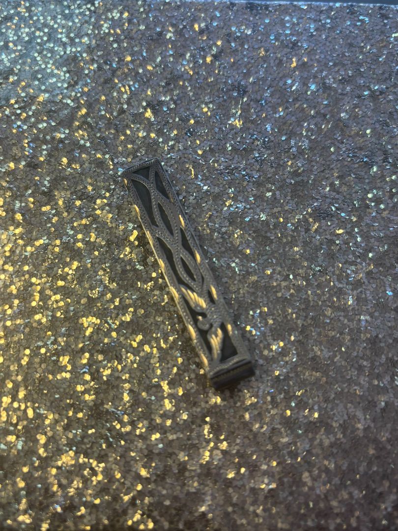 sterling silver NA tie bar, Dimensions (approx.): Length: 2.5 inches (6.35 cm) Width: 0.4 inches (1 cm) Clip style: Folded spring tension