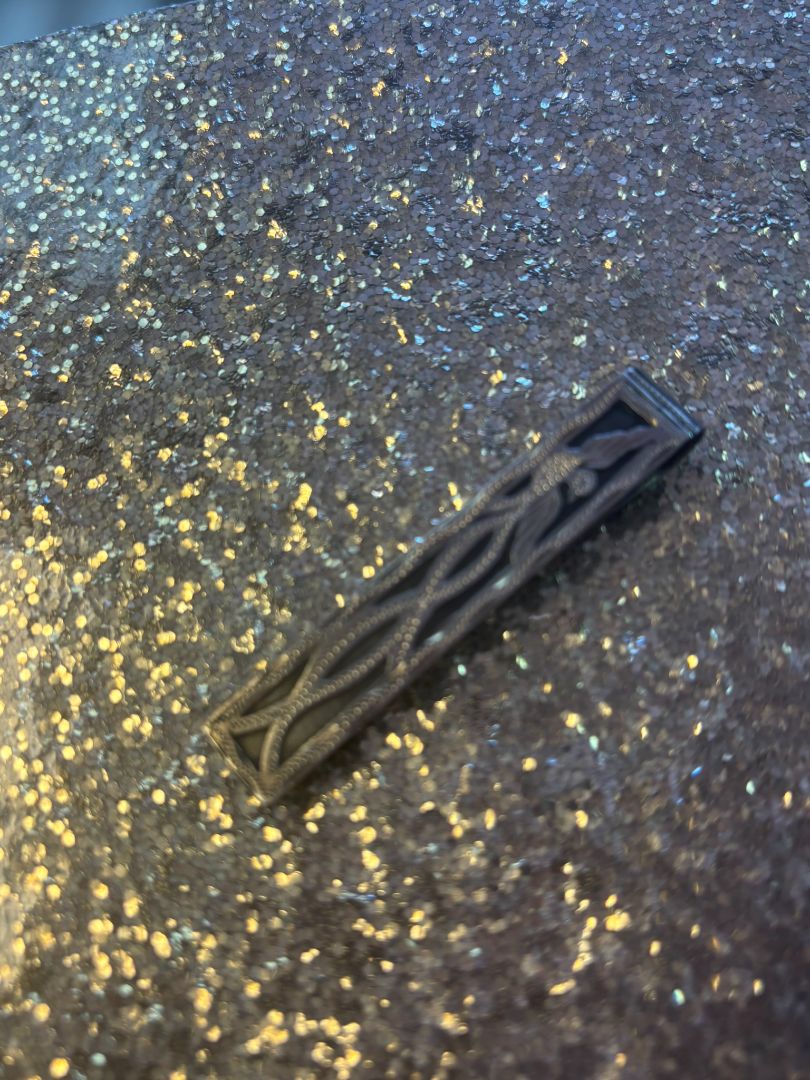 sterling silver NA tie bar, Dimensions (approx.): Length: 2.5 inches (6.35 cm) Width: 0.4 inches (1 cm) Clip style: Folded spring tension