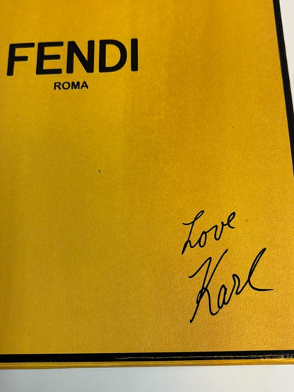 purple and green FENDI fur “monster” bag charm, pom-pom diameter: 10 cm (4 in) Total hanging drop (ring + strap + fur): ~20 cm (8 in)