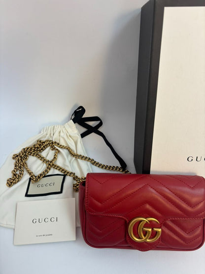 red GUCCI super Mini Bag Matelassé Leather, Width: 6.2 in (16 cm) Height: 4 in (10.2 cm) Depth: 1.8 in (4.6 cm) Chain Drop: 22 in (crossbody)