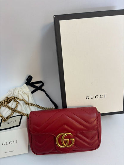 red GUCCI super Mini Bag Matelassé Leather, Width: 6.2 in (16 cm) Height: 4 in (10.2 cm) Depth: 1.8 in (4.6 cm) Chain Drop: 22 in (crossbody)