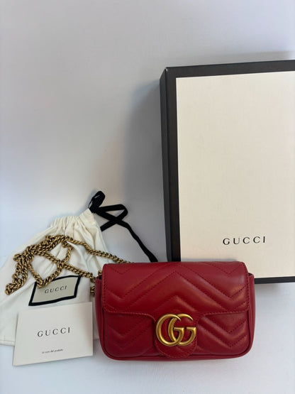 red GUCCI super Mini Bag Matelassé Leather, Width: 6.2 in (16 cm) Height: 4 in (10.2 cm) Depth: 1.8 in (4.6 cm) Chain Drop: 22 in (crossbody)
