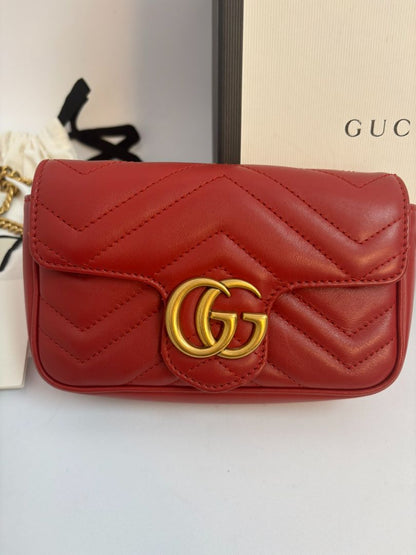 red GUCCI super Mini Bag Matelassé Leather, Width: 6.2 in (16 cm) Height: 4 in (10.2 cm) Depth: 1.8 in (4.6 cm) Chain Drop: 22 in (crossbody)