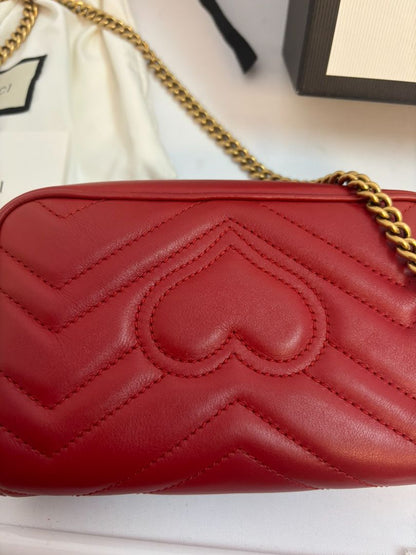 red GUCCI super Mini Bag Matelassé Leather, Width: 6.2 in (16 cm) Height: 4 in (10.2 cm) Depth: 1.8 in (4.6 cm) Chain Drop: 22 in (crossbody)