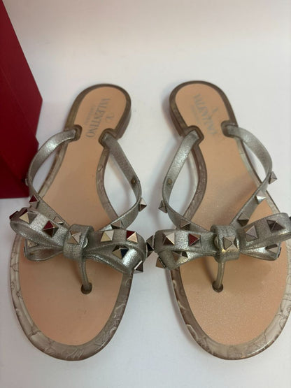silver Valentino Garavani Rockstud Jelly Bow Thong Sandals, 37/ DIMENSIONS (Size EU 39 / US 9) Footbed Length: ~10.5 in Heel Height: Flat (~0.25 in molded heel)