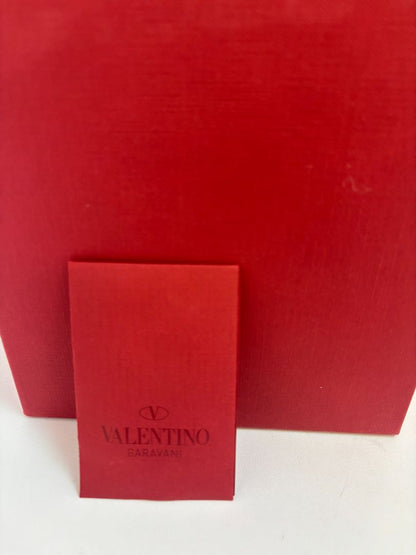 silver Valentino Garavani Rockstud Jelly Bow Thong Sandals, 37/ DIMENSIONS (Size EU 39 / US 9) Footbed Length: ~10.5 in Heel Height: Flat (~0.25 in molded heel)
