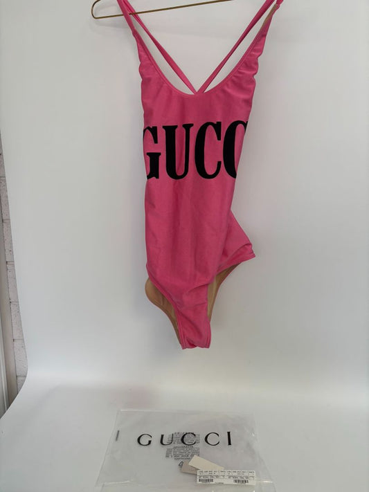 pink GUCCI One-Piece Logo Swimsuit, (Size S): Length (top to bottom): ~25–27 in Bust (unstretched): ~12 in Waist: ~11 in