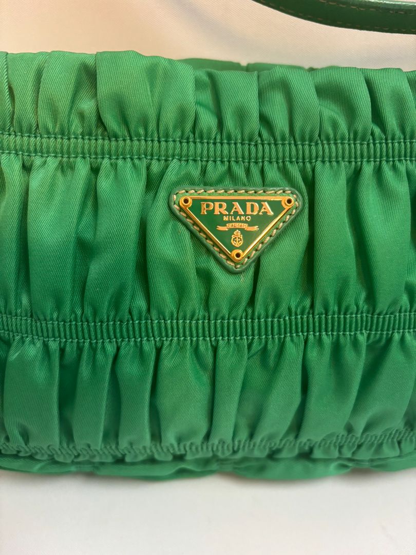 green Prada Tessuto Nylon mini shoulder bag, Length: 9 in Height: 5.5 in Depth: 2.5 in Strap Drop: 7 in (shoulder)