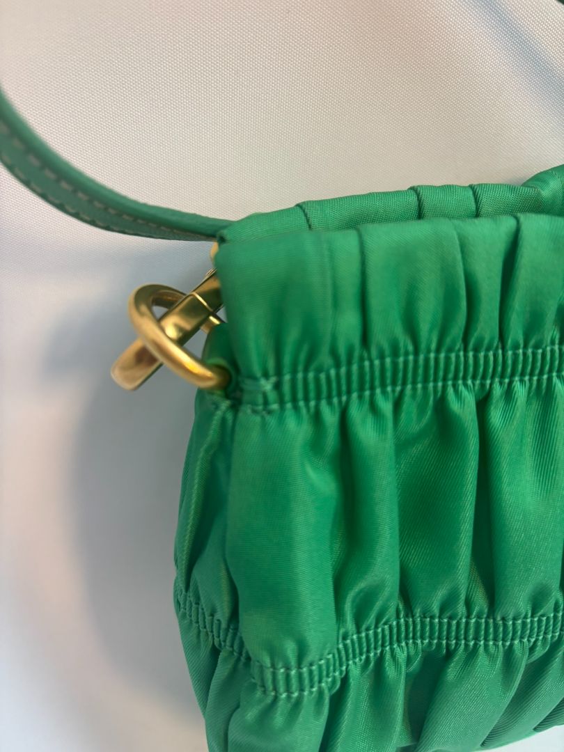 green Prada Tessuto Nylon mini shoulder bag, Length: 9 in Height: 5.5 in Depth: 2.5 in Strap Drop: 7 in (shoulder)