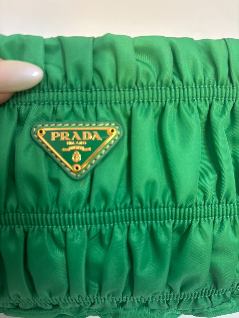 green Prada Tessuto Nylon mini shoulder bag, Length: 9 in Height: 5.5 in Depth: 2.5 in Strap Drop: 7 in (shoulder)