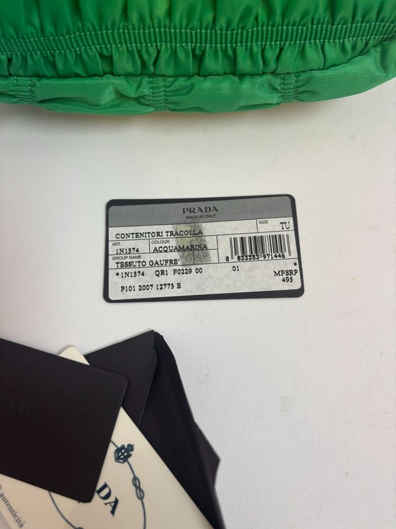 green Prada Tessuto Nylon mini shoulder bag, Length: 9 in Height: 5.5 in Depth: 2.5 in Strap Drop: 7 in (shoulder)