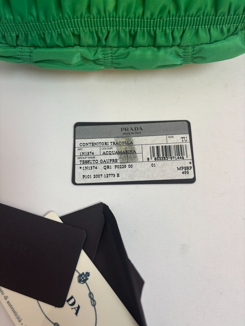 green Prada Tessuto Nylon mini shoulder bag, Length: 9 in Height: 5.5 in Depth: 2.5 in Strap Drop: 7 in (shoulder)