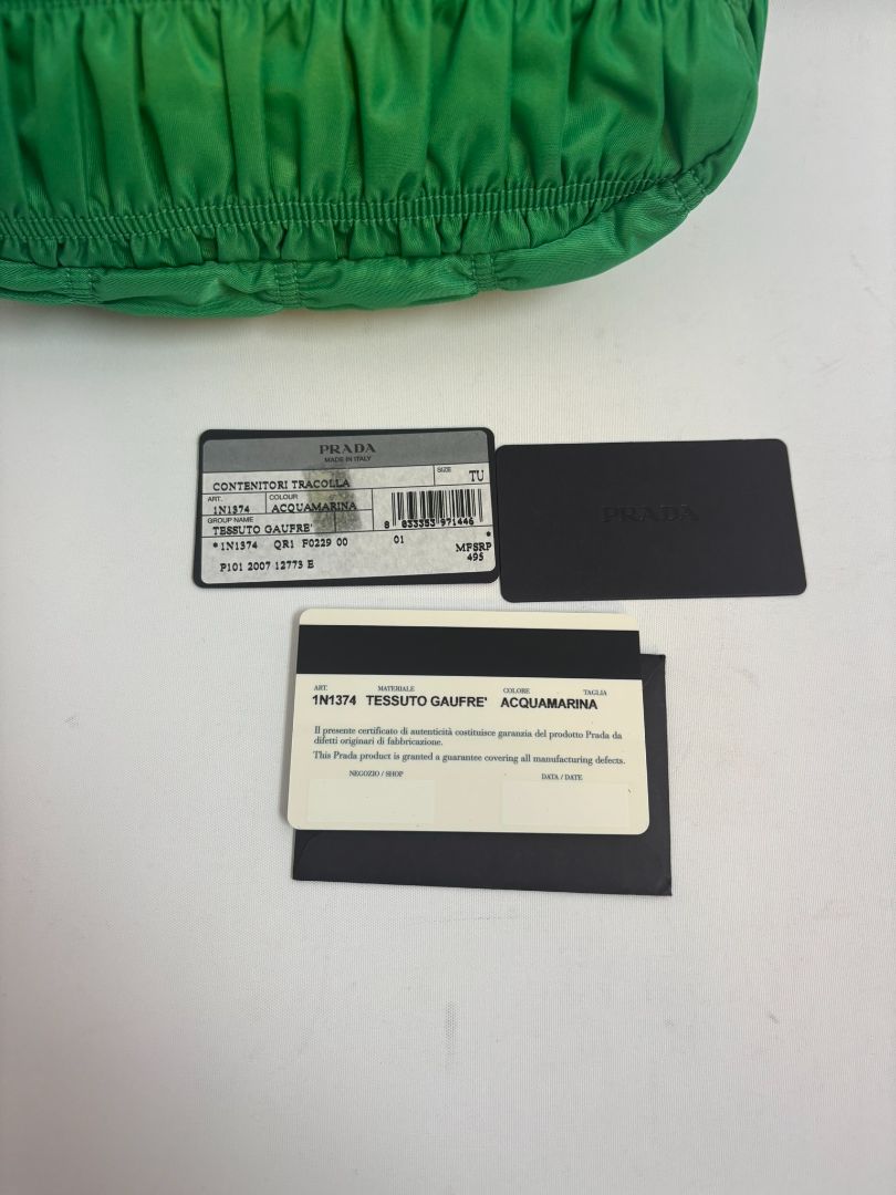 green Prada Tessuto Nylon mini shoulder bag, Length: 9 in Height: 5.5 in Depth: 2.5 in Strap Drop: 7 in (shoulder)