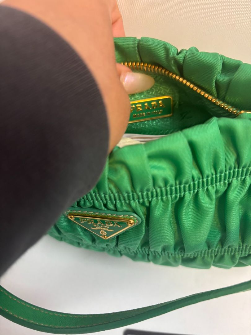 green Prada Tessuto Nylon mini shoulder bag, Length: 9 in Height: 5.5 in Depth: 2.5 in Strap Drop: 7 in (shoulder)