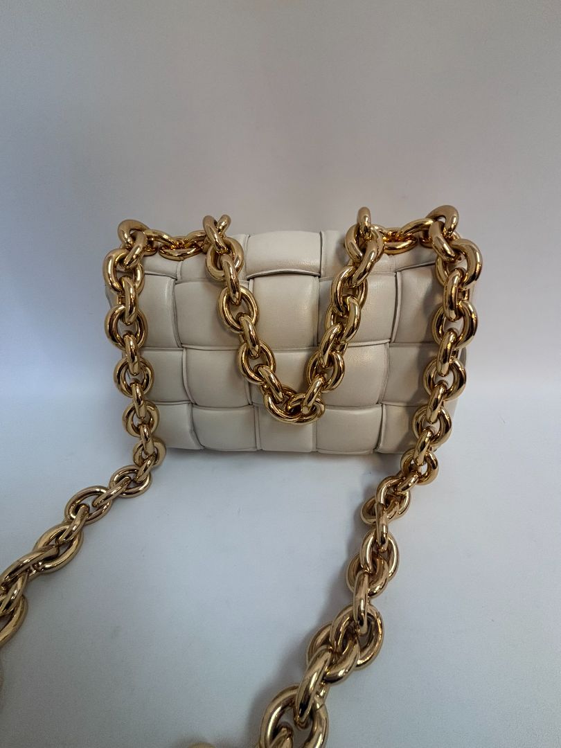 chalk Bottega Veneta padded woven cassette design Daniel Lee, Width: ~9.5 inches (24 cm) Height: ~7 inches (18 cm) Depth: ~2 inches (5 cm) Top Handle Drop: ~5 inches (13 cm) Shoulder Strap Drop: ~18 inches (46 cm)