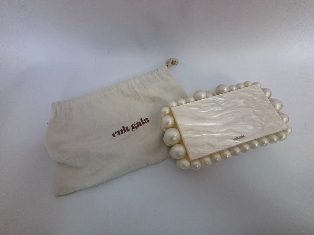 pearl Cult Gaia EOS pearl acrylic clutch, Width: 7.5 inches Height: 5 inches Depth: 2 inches