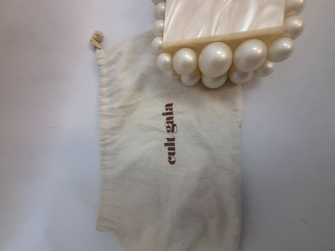 pearl Cult Gaia EOS pearl acrylic clutch, Width: 7.5 inches Height: 5 inches Depth: 2 inches