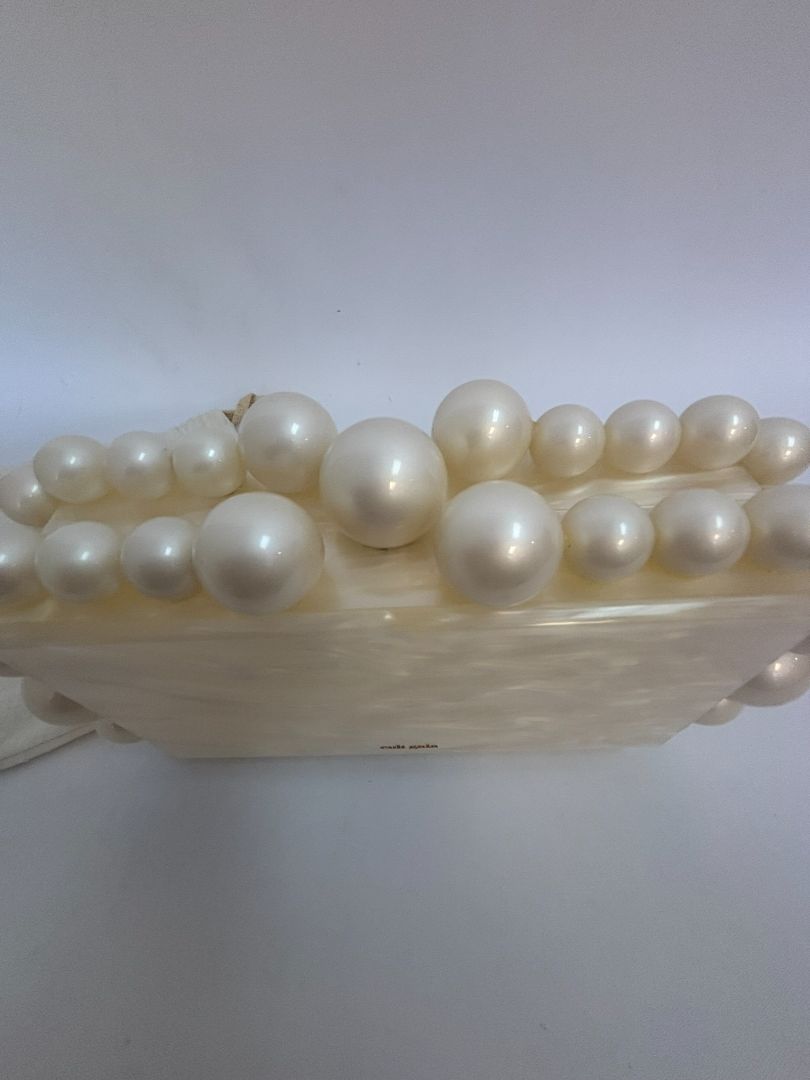 pearl Cult Gaia EOS pearl acrylic clutch, Width: 7.5 inches Height: 5 inches Depth: 2 inches