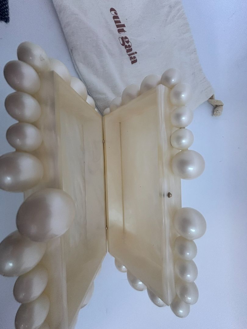 pearl Cult Gaia EOS pearl acrylic clutch, Width: 7.5 inches Height: 5 inches Depth: 2 inches