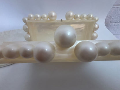 pearl Cult Gaia EOS pearl acrylic clutch, Width: 7.5 inches Height: 5 inches Depth: 2 inches