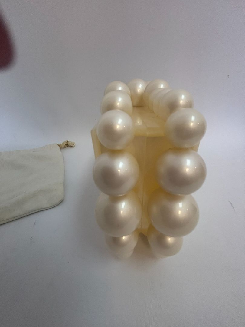 pearl Cult Gaia EOS pearl acrylic clutch, Width: 7.5 inches Height: 5 inches Depth: 2 inches