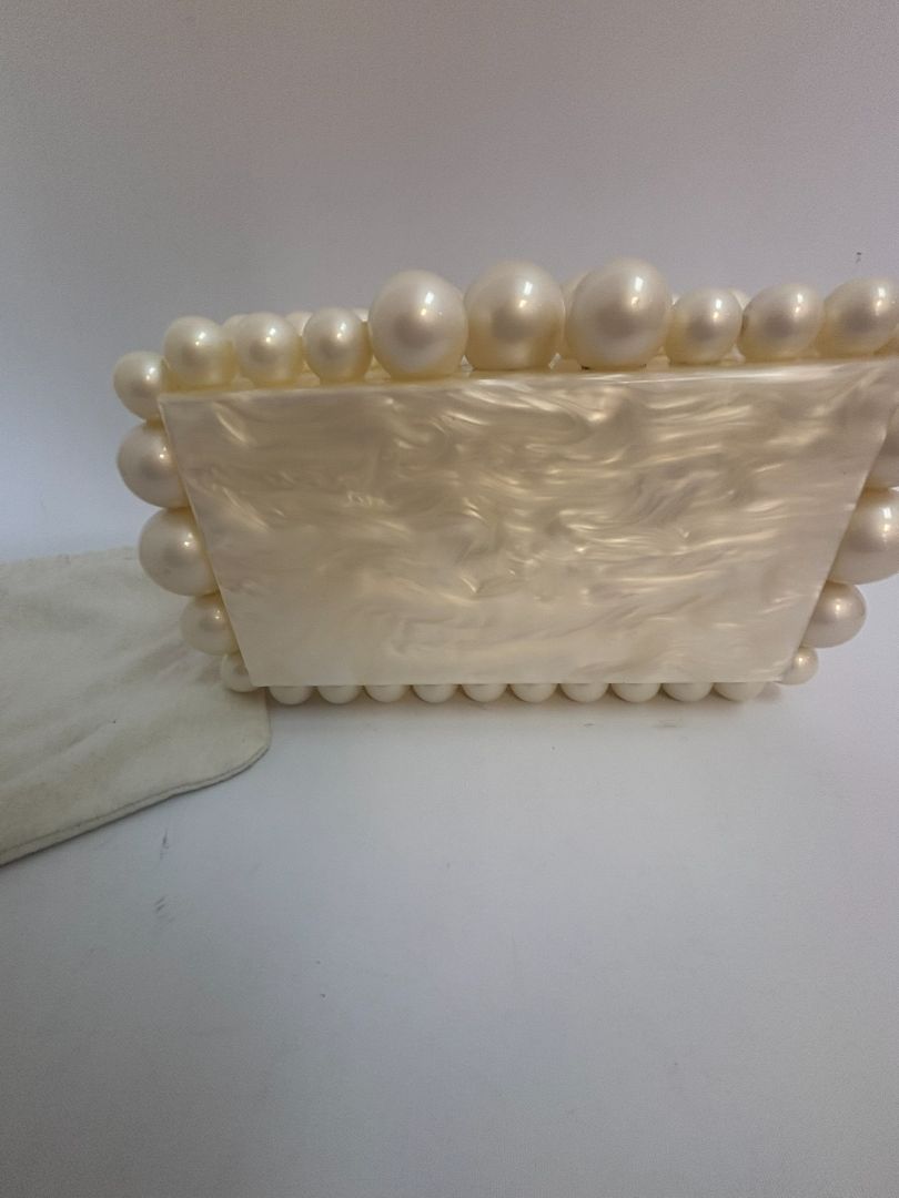 pearl Cult Gaia EOS pearl acrylic clutch, Width: 7.5 inches Height: 5 inches Depth: 2 inches