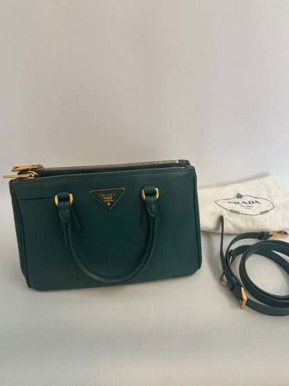 deep teal Prada Model: Double Zip Lux Tote (also known as Galleria Tote), Width: 11.5 inches (29 cm) Height: 8 inches (20 cm) Depth: 5 inches (13 cm) Handle Drop: 4 inches (10 cm) Strap Drop: 19–21 inches adjustable (48–53 cm)