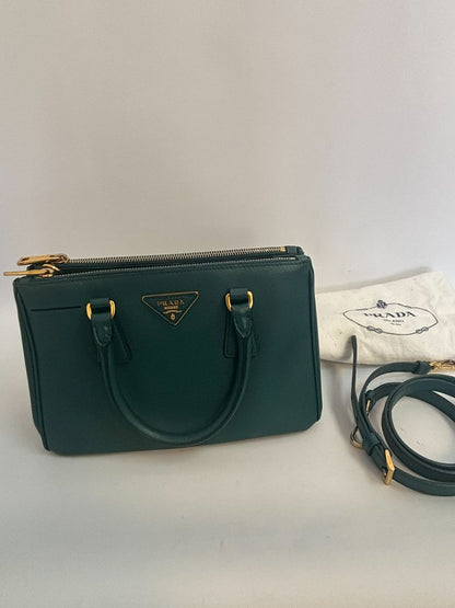 deep teal Prada Model: Double Zip Lux Tote (also known as Galleria Tote), Width: 11.5 inches (29 cm) Height: 8 inches (20 cm) Depth: 5 inches (13 cm) Handle Drop: 4 inches (10 cm) Strap Drop: 19–21 inches adjustable (48–53 cm)