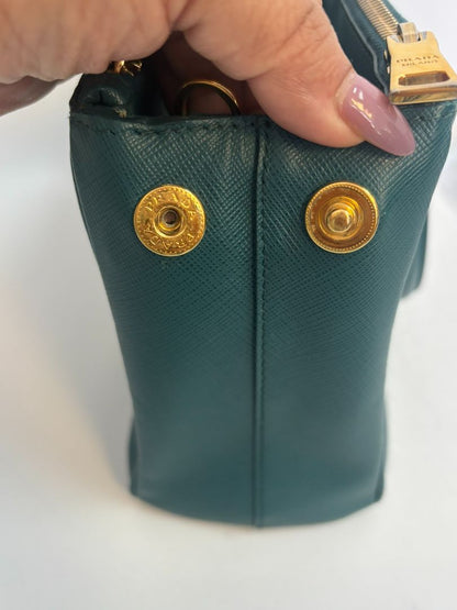 deep teal Prada Model: Double Zip Lux Tote (also known as Galleria Tote), Width: 11.5 inches (29 cm) Height: 8 inches (20 cm) Depth: 5 inches (13 cm) Handle Drop: 4 inches (10 cm) Strap Drop: 19–21 inches adjustable (48–53 cm)