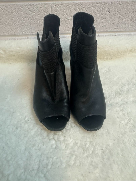 black Jimmy Choo boots, 40 EU /Heel Height: 3.5–4 inches Shaft Height: ~4.5 inches Toe: Almond peep-toe Width: Standard