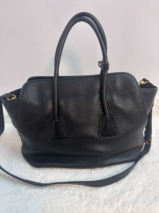 black PRADA top handle calfskin with strap, Width: 13.5–14 in (34–36 cm) Height: 10–10.5 in (25–27 cm) Depth: 6 in (15 cm) Handle Drop: ~4.5 in Shoulder Strap Drop: ~20–22 in (adjustable, detachable)