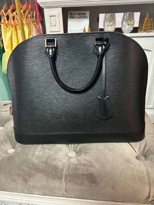 Louis Vuitton Alma GM handbag in black Epi leather with silver-tone hardware, double zip closure, and structured top handles.