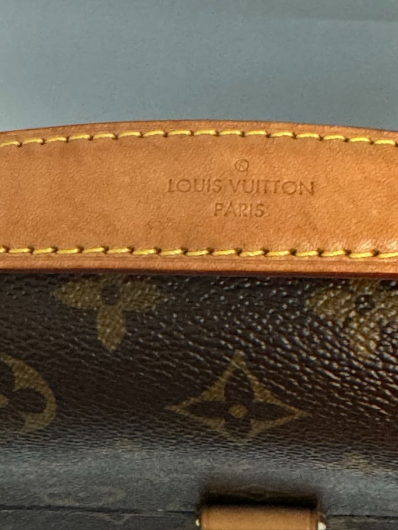 Louis Vuitton Pochette Métis in Monogram canvas, featuring the iconic LV logo print, a structured flap design, gold-tone hardware, and a detachable shoulder strap for versatile wear. This elegant crossbody bag is perfect for both day and night occasions.