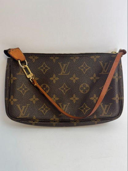 Louis Vuitton Pochette Monogram clutch bag with iconic brown monogram canvas and gold-tone hardware.