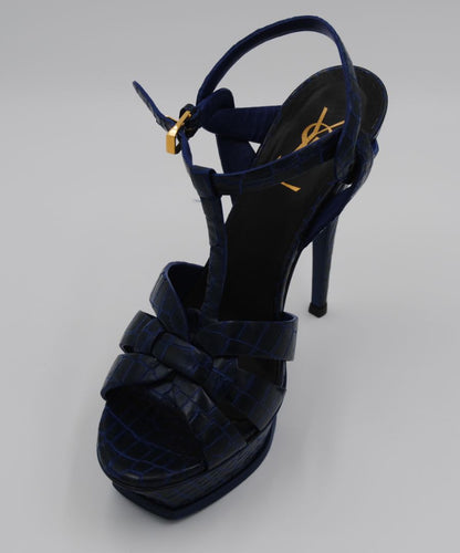 Saint Laurent Calfskin Crocodile Embossed Tribute 105 Platform Sandals in Marinette

Saint Laurent calfskin crocodile embossed Tribute 105 platform sandals, women’s size 38 in Marinette, luxury designer heels with buckle ankle strap and 105mm stiletto heel