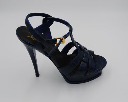 Saint Laurent Calfskin Crocodile Embossed Tribute 105 Platform Sandals in Marinette

Saint Laurent calfskin crocodile embossed Tribute 105 platform sandals, women’s size 38 in Marinette, luxury designer heels with buckle ankle strap and 105mm stiletto heel